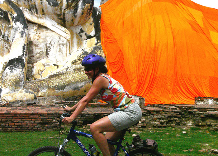 Woman Cycling in Ayutthaya